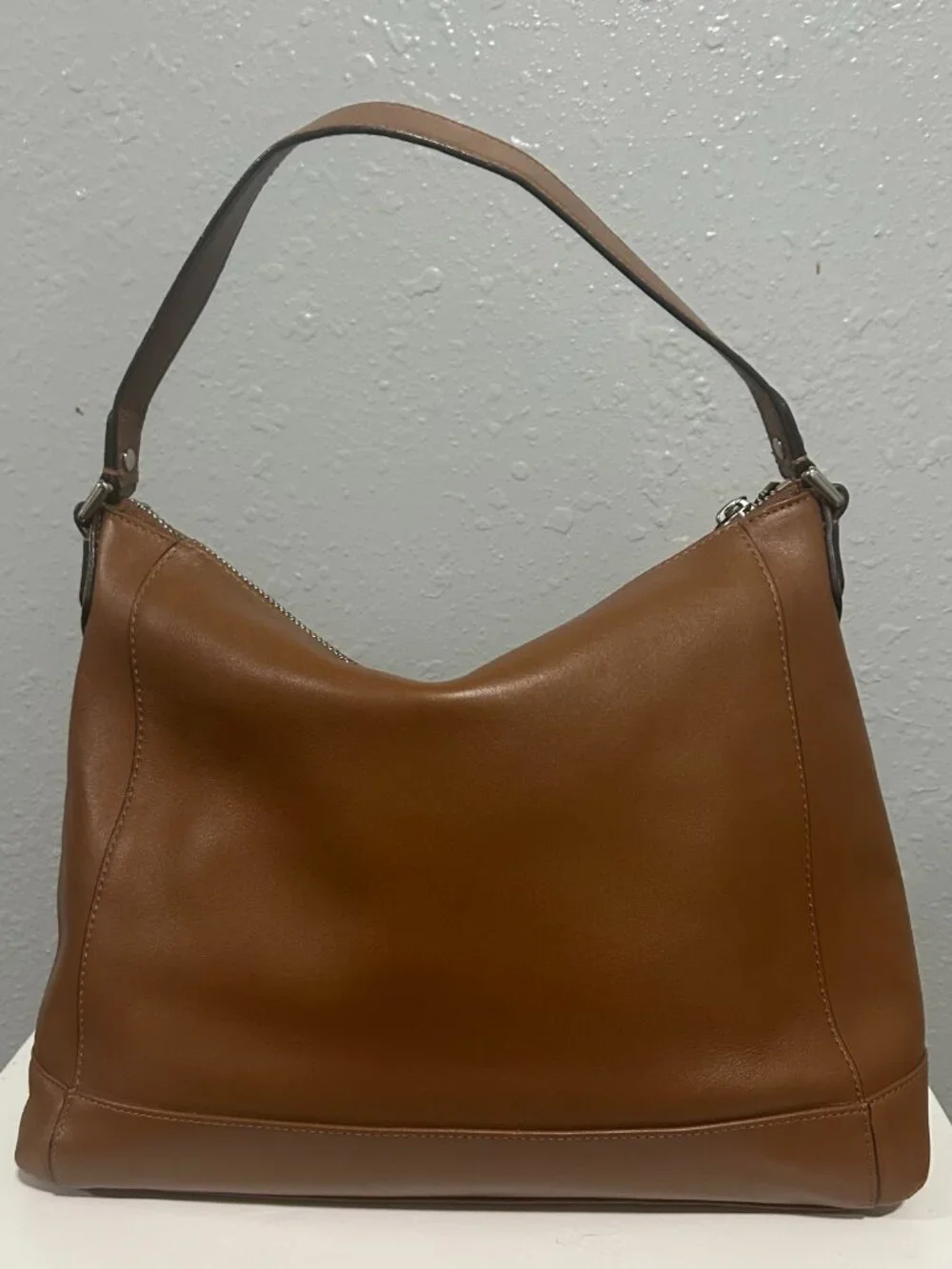 Vintage coach leather hobo in color camel with silver hardware.